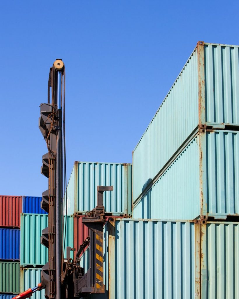 cargo-containers-in-shipping-dock-e1657115626198-prdasqzvmgptw2oipw4w1awnwxmugsw2rmuazr5dz4